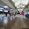 Older person trying to open car doors at rest area