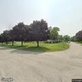 Person bleeding at intersection in Aroma Park