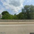 Tree blocking State Road 49 near railroad tracks