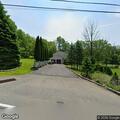 Burglary alarm with unknown truck in driveway