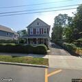 Officers check car parked outside Greenport home