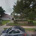 Male fallen by door, unresponsive in Lovell Village