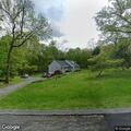 Downed electrical wire burning behind Stillman Lane home