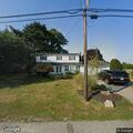 Person knocking on doors on Gillette Drive