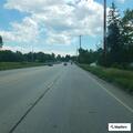 Officer stops silver Mazda at Portage Motors