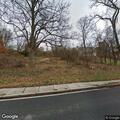 Tree branch partially blocking Lake Road traffic