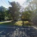 Rocks outlining property thrown into driveway