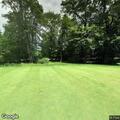 Woman injured after being pinned by car and golf cart