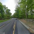 Disabled car with flat tire on Route 9 southbound