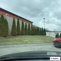 Suspicious man circling parking lot in black pickup