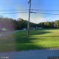 Brush fire spreading from wood pile in Springfield