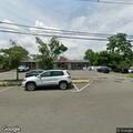 Person with agonal breathing receiving CPR at Girl Scout property
