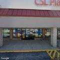 Vehicle blocking parking spaces behind Wing Stop