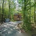 Person experiencing back pain at residence in Tobyhanna