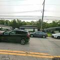 Disabled vehicle awaiting tow near Congers shop