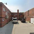 Elderly woman with breathing difficulty at care center