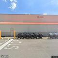 Dog in distress inside vehicle at store parking lot