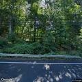 Tree blocking road on New Canaan Road in Wilton