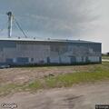 Irrigation system spraying water onto roadway
