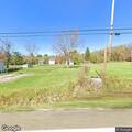 Vehicle crash with car in ditch on Airport Road