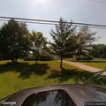 Vehicle damages yard and fence, then flees scene