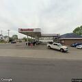 Stalled car blocking intersection near Speedway