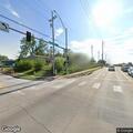 Men seen hitting woman in moving car