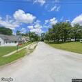 Disabled Chevy Suburban blocking roadway
