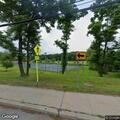 Person sleeping in tent at Leonard Park