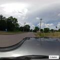 Police check on pickup truck stopped at intersection