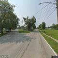 Person reports severe body pain near Second Street
