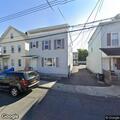 Car hits building and damages siding