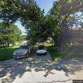 Complaint over overgrown yard and trash at residence