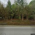 Tree debris left in road creates traffic hazard