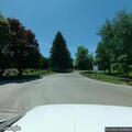 Truck debris creates roadway hazard near business