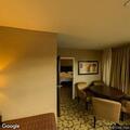 Man with toothache and panic attack at hotel lobby