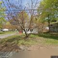 Car parked on lawn damages front yard