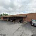 Male patient experiencing chest pain at health center