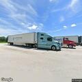 Traffic stop involving white semi trailer