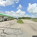 Person locked out of car at West Walnut gas pump