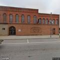 Woman in her 70s falls in parking lot at 8 Main Street