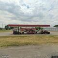 Suspicious vehicle reported at gas station lot