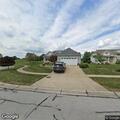 Officer conducts golf cart inspection at residence