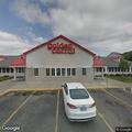 Elderly female choking with blocked airway at restaurant