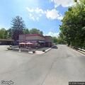 Oil spill creating road hazard on Oakland Avenue