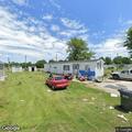 Person experiencing abdominal pain near (number withheld) Street lot in Jerry City