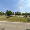 Person unresponsive at golf course receiving CPR