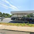 Car hits gas station support pole, no fuel leak
