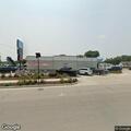 Officer checks group at Family Express