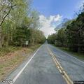 Tree on power lines over roadway on Route 402